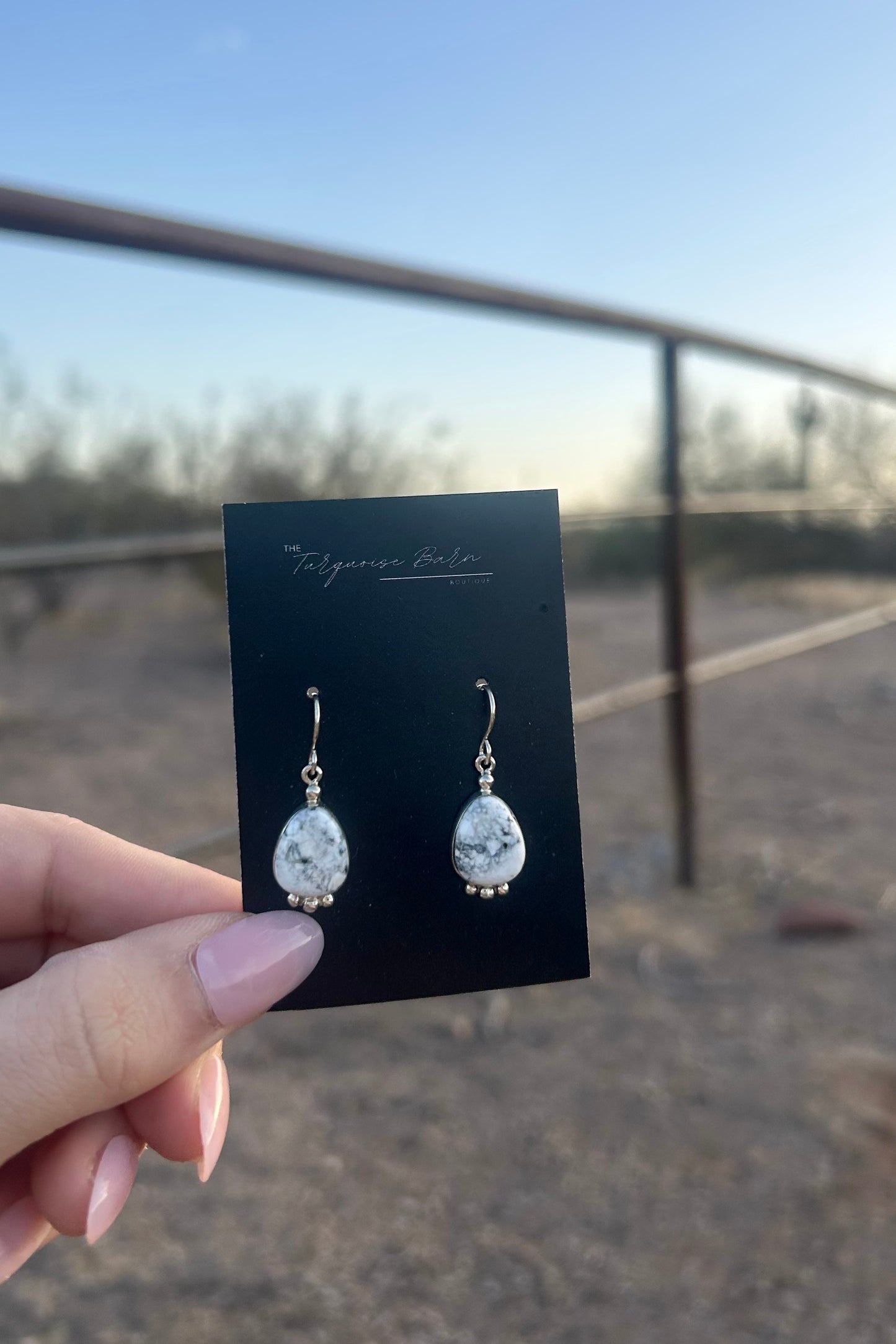 White Buffalo Dangle Earrings