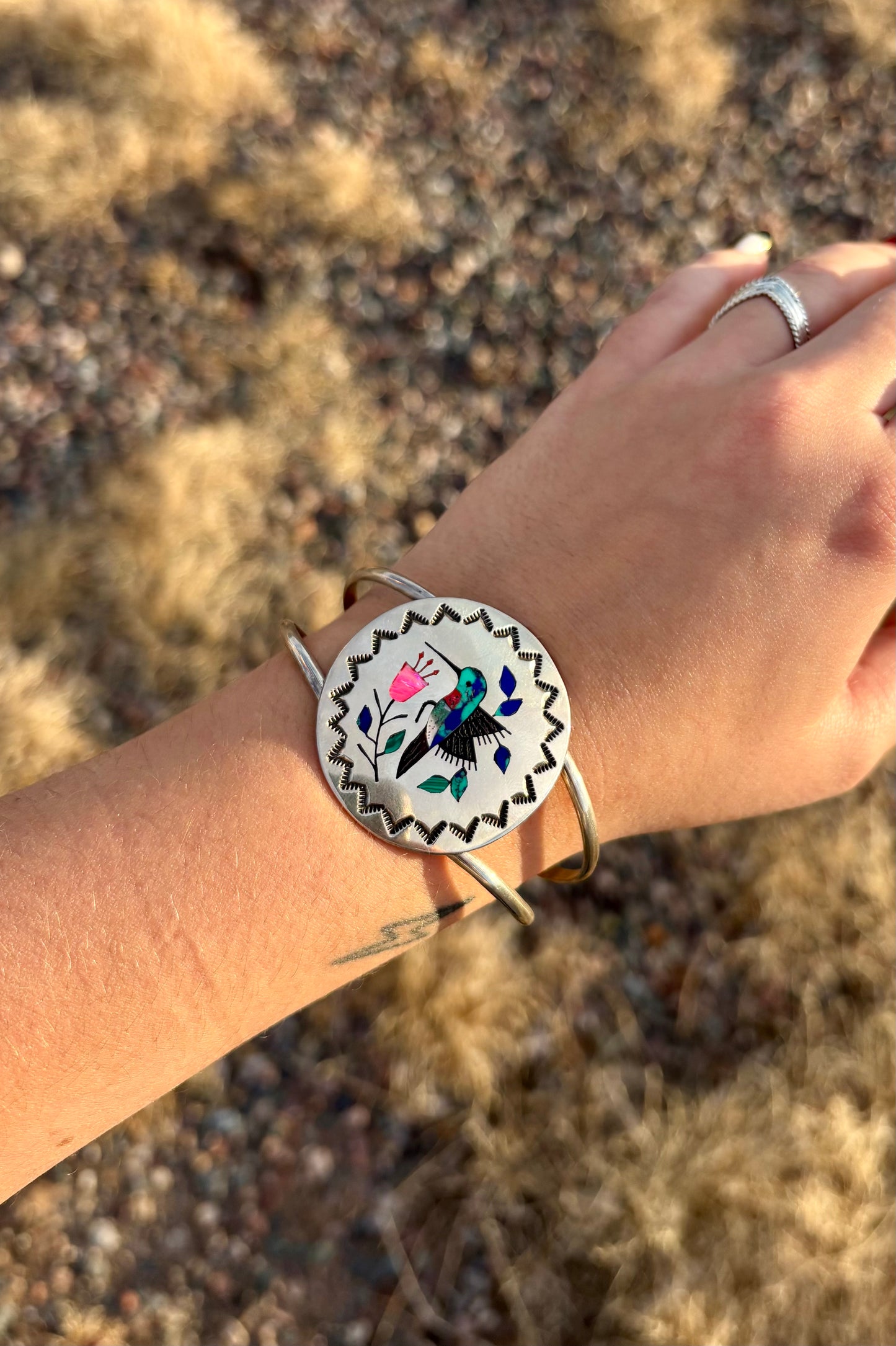 Silver hummingbird cuff