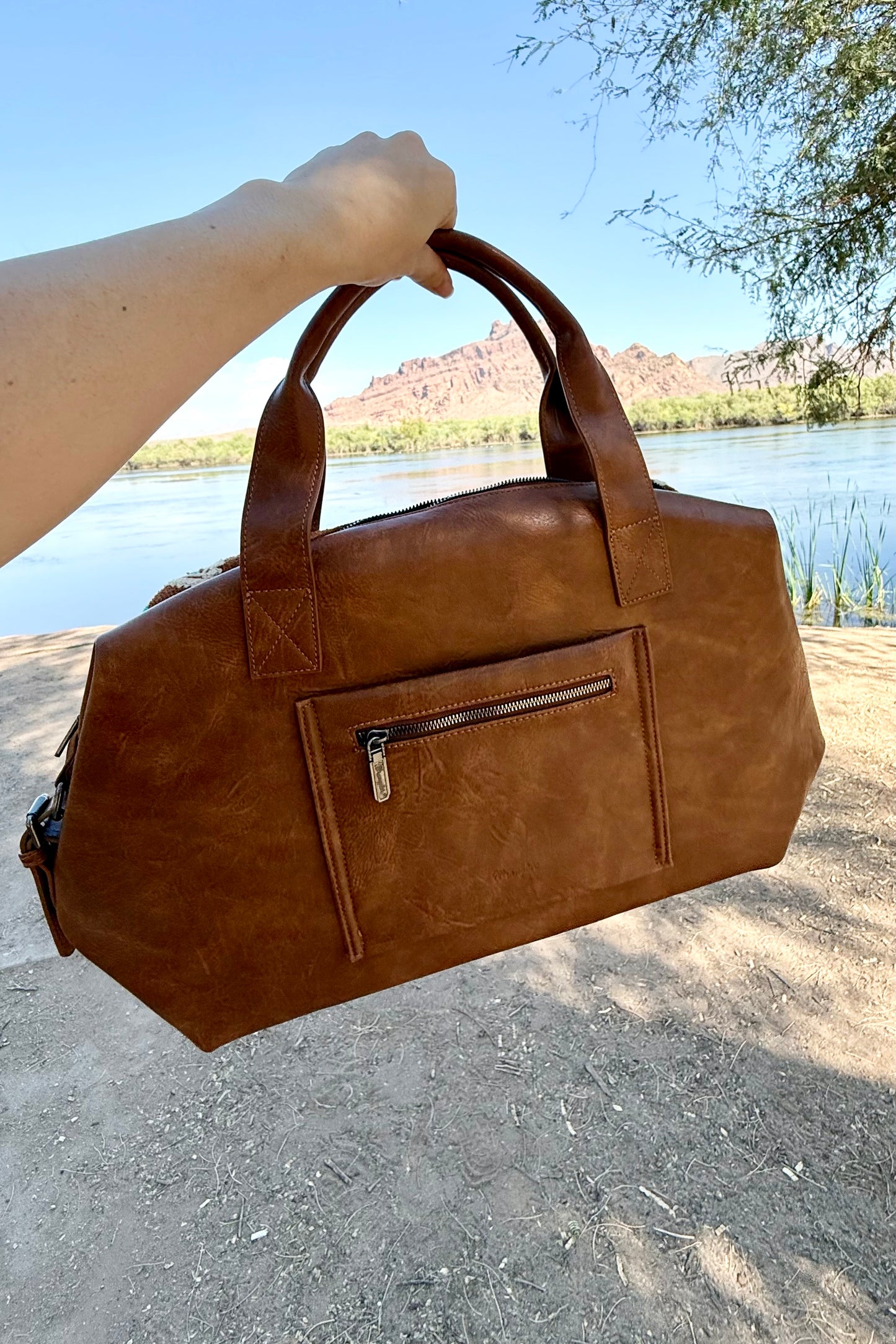 BROWN AZTEC KNITTED TROLLEY SLEEVE DUFFLE BAG